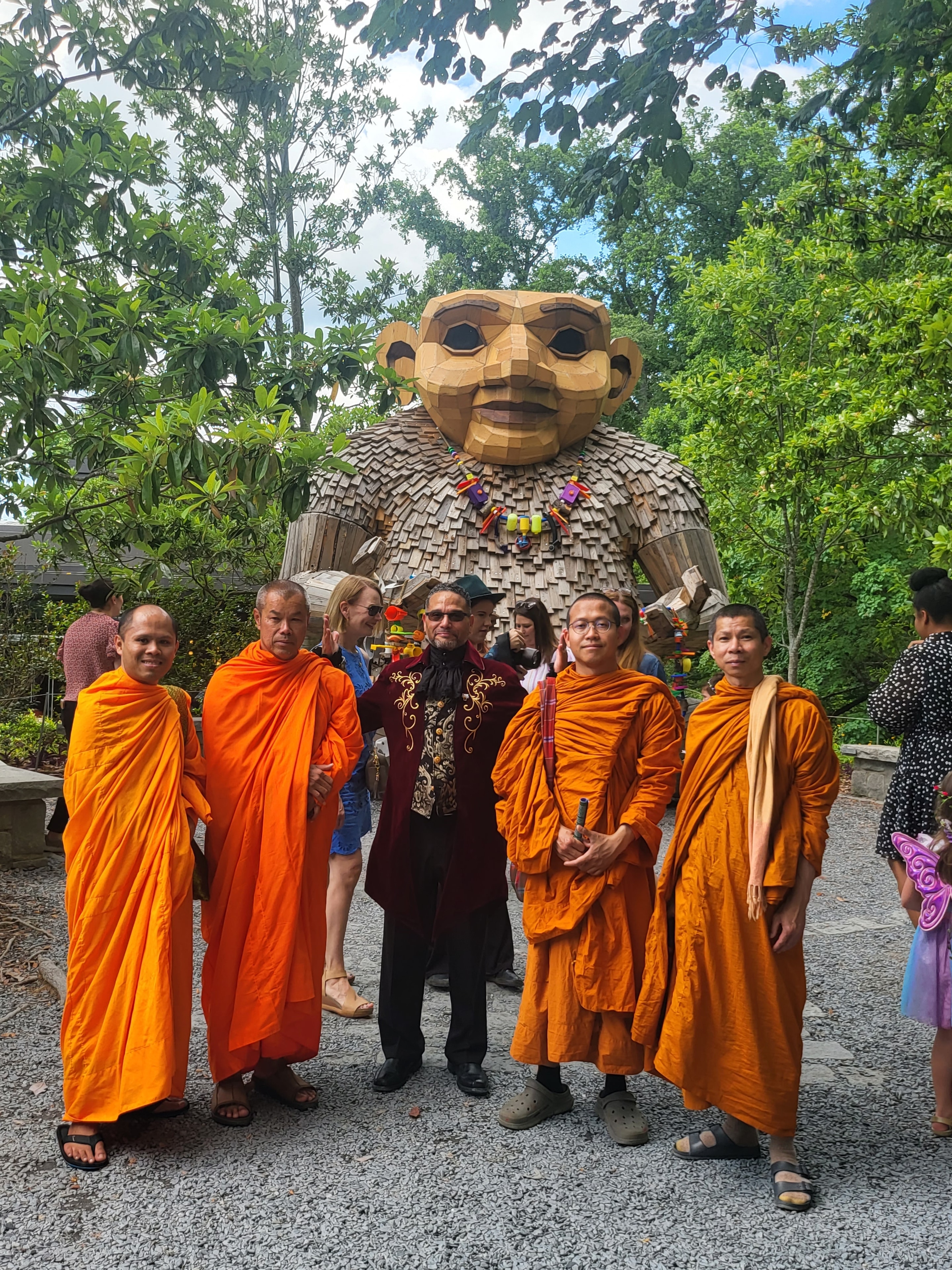 C. Magic with Buddhist monks at outdoor sculpture event