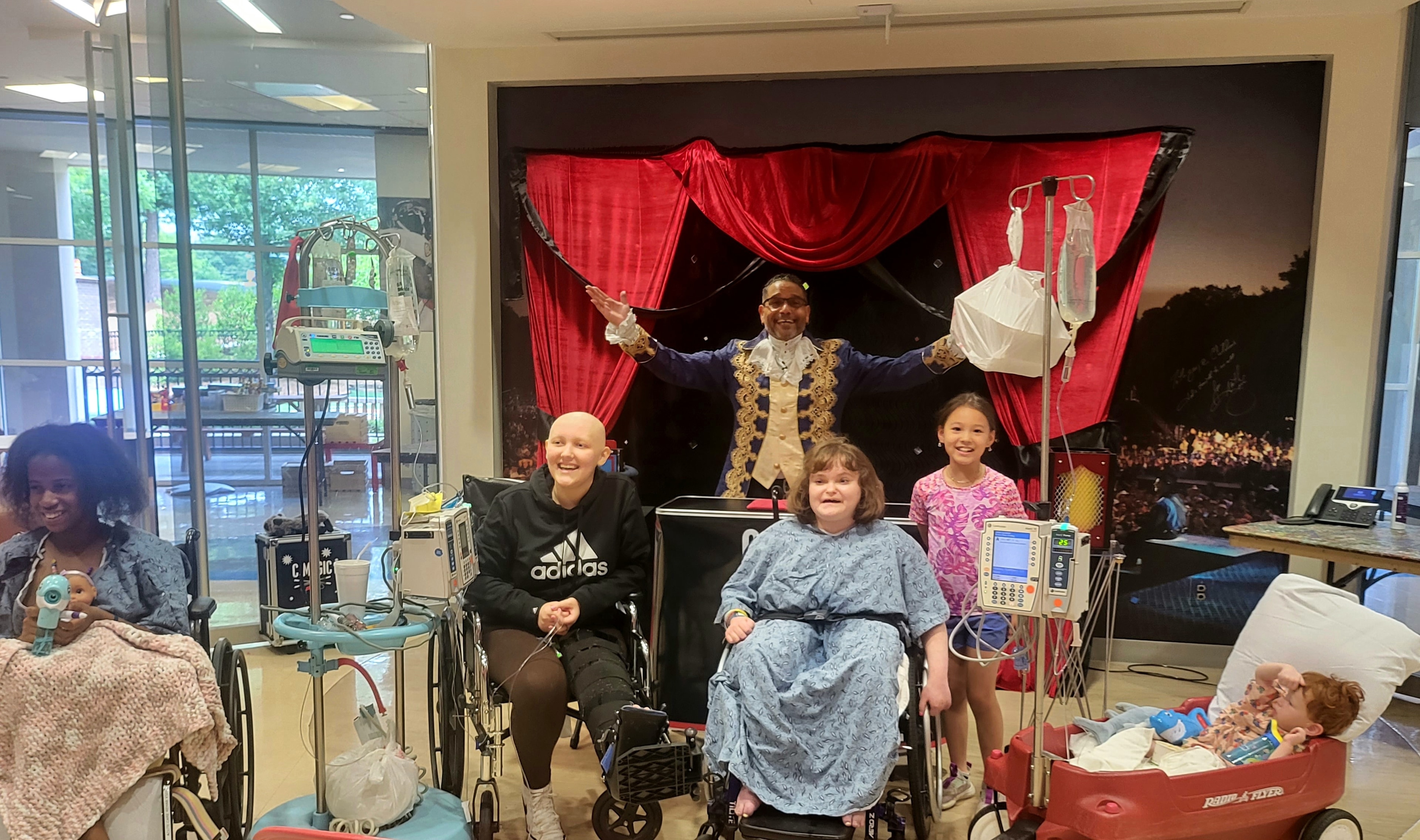 C. Magic performing for children at hospital