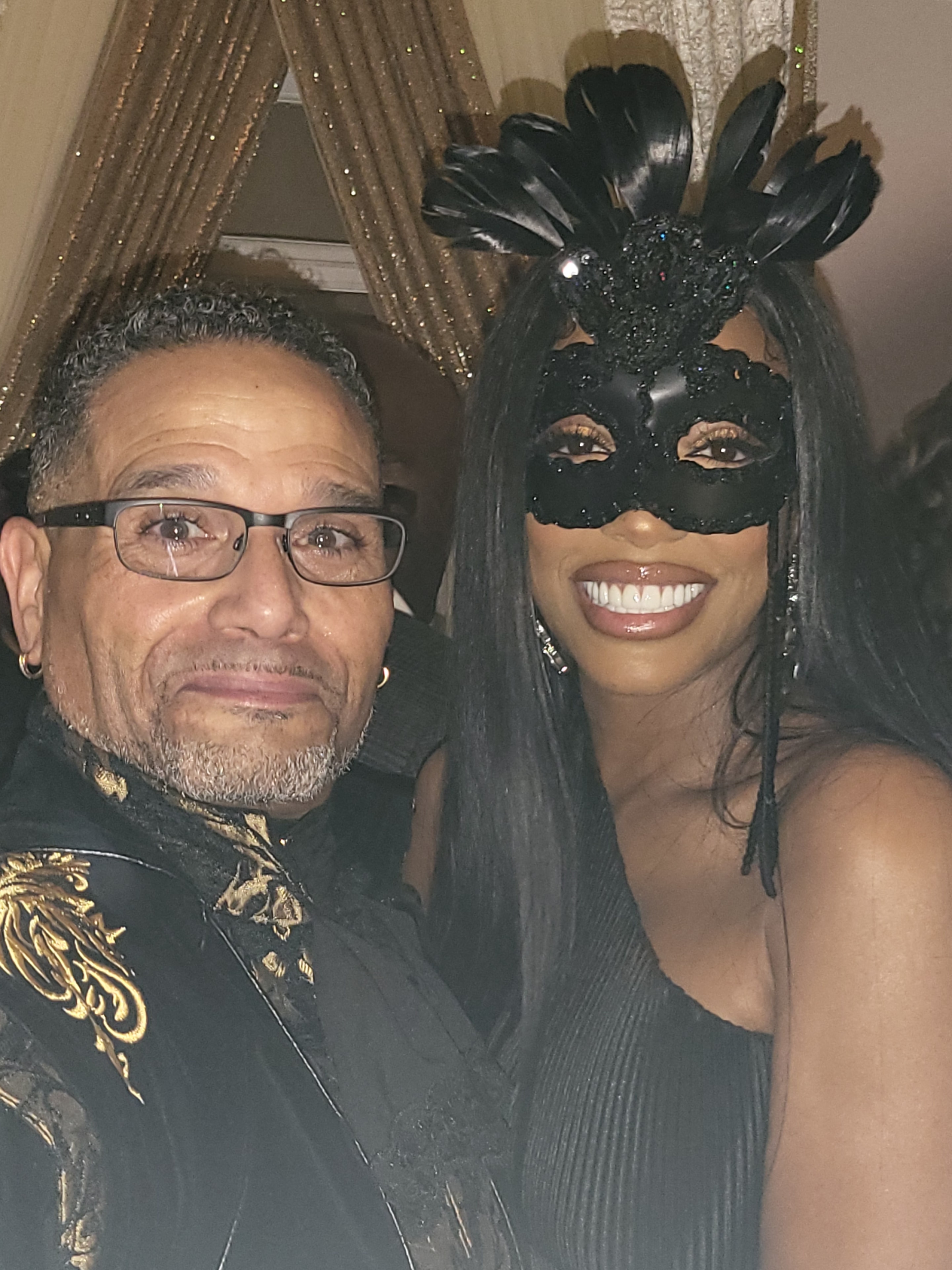 C. Magic with guest at masquerade celebration